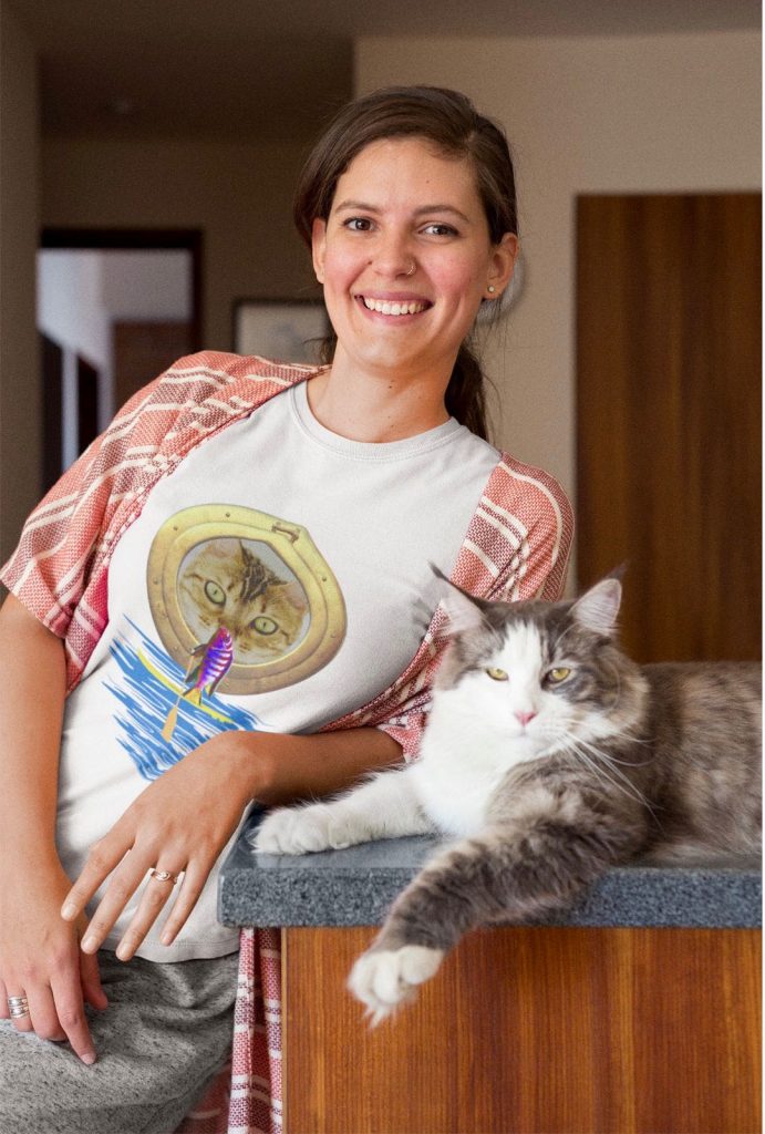 Happy woman with cat and cool t-shirt with stand up paddle fish on SUP present present idea